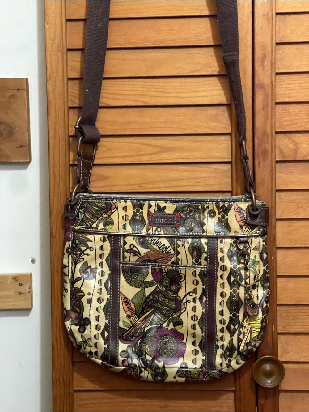 Sakroots Multicolor Floral Canvas Crossbody Bag with Black Trim